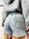 Short Levi’s Vintage bagno chiaro con borchie