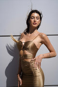Abito bronzo anelli oro