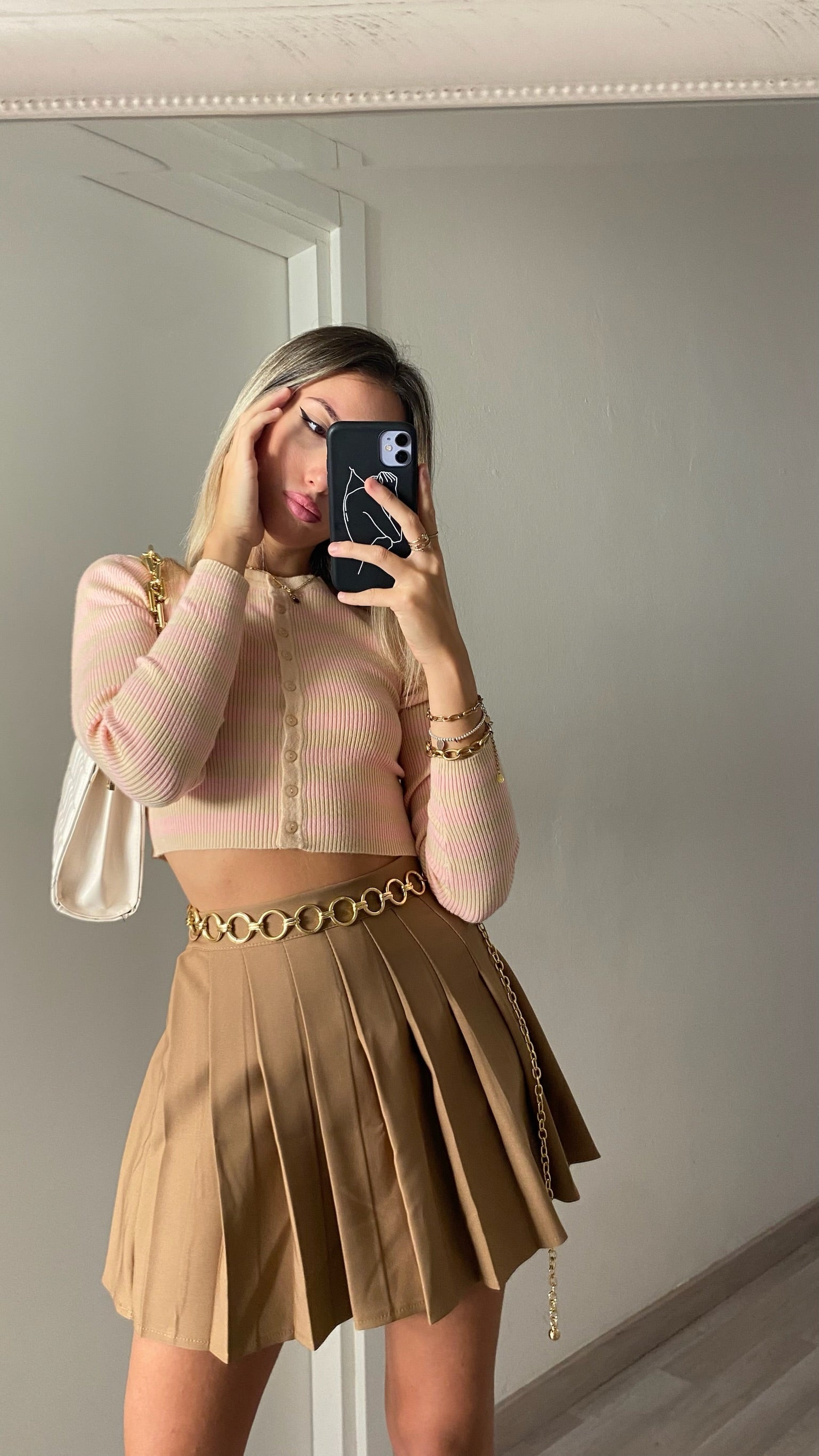 Maglioncino crop a righe nude