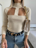 Maglia crema con apertura