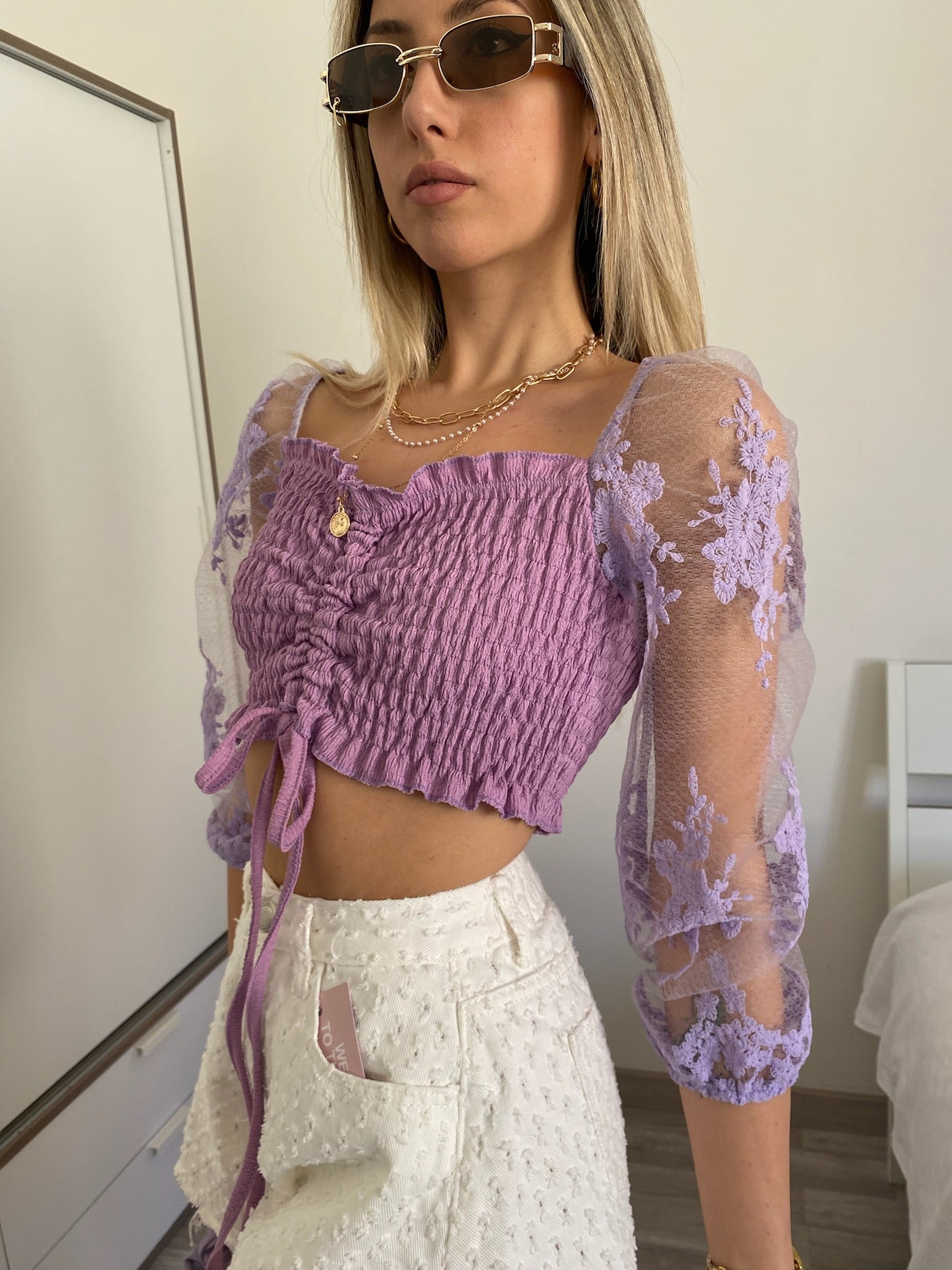 Top lilla manica velata