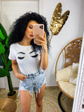 Short jeans chiaro con borchie