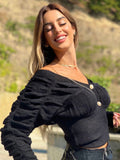 Maglione nero con lacci