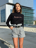 Pull nero e rosa