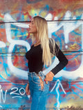 Top a costine con scollo a V