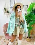 Camicia floreale con borsetta verdeacqua