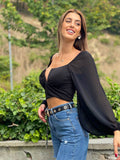 Blusa con scollo a V maniche velate