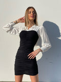 Abito arricciato nero con camicia