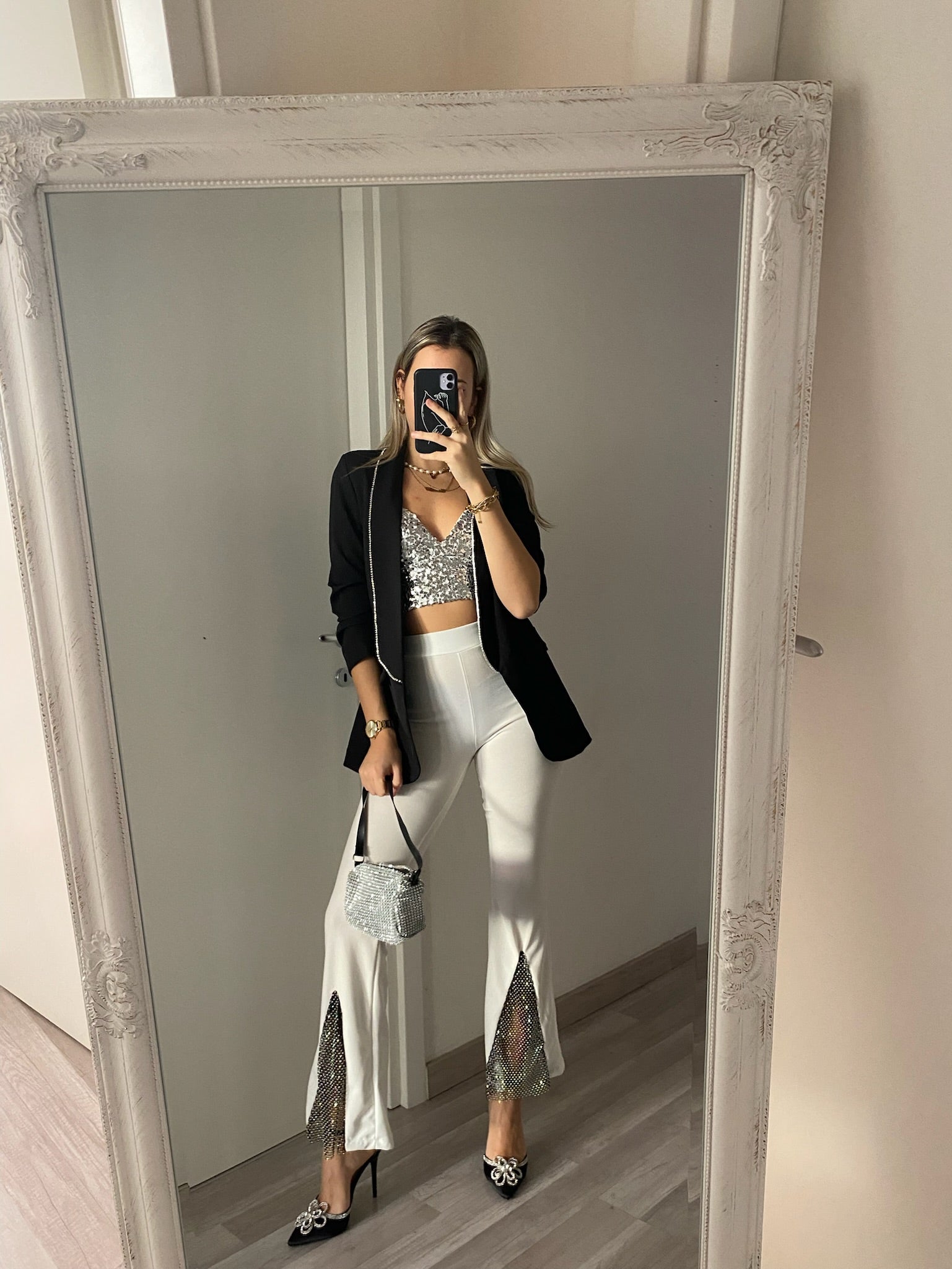 Pantaloni a zampa con strass bianco