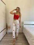 Jeans bianco cuori rossi