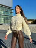 Maglione panna con trecce