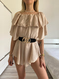 Tutina beige scollo a barchetta e balze