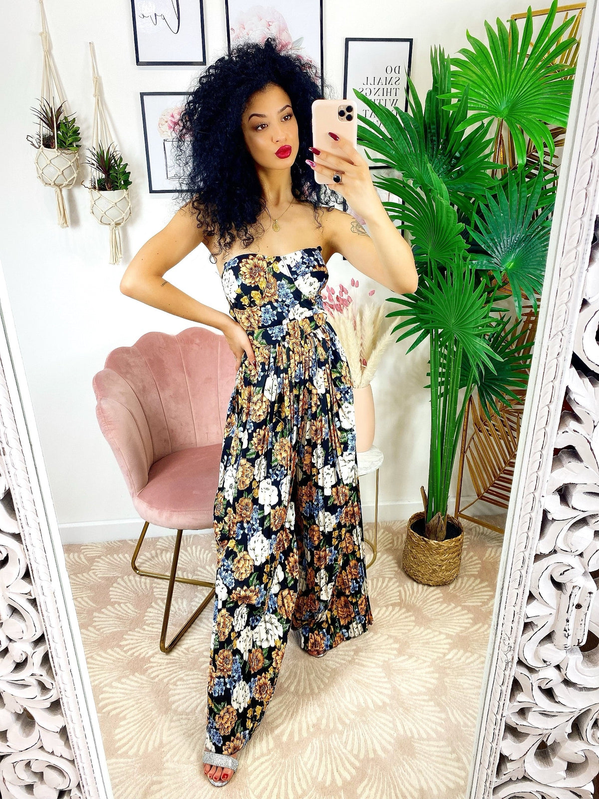 Tuta floreale con pantalone a pieghine