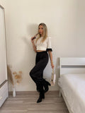 T-shirt con piume nere