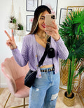 Cardigan primaverile con trecce lilla