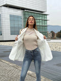 Jeans aderente sfrangiato sotto