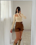 Maglia crema con apertura
