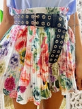 Short a pieghine con fiori sfumati lilla