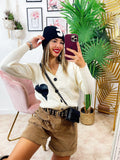 Maglione panna con cuore in pelle