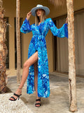 Abito con maxi spacco azzurro con piume