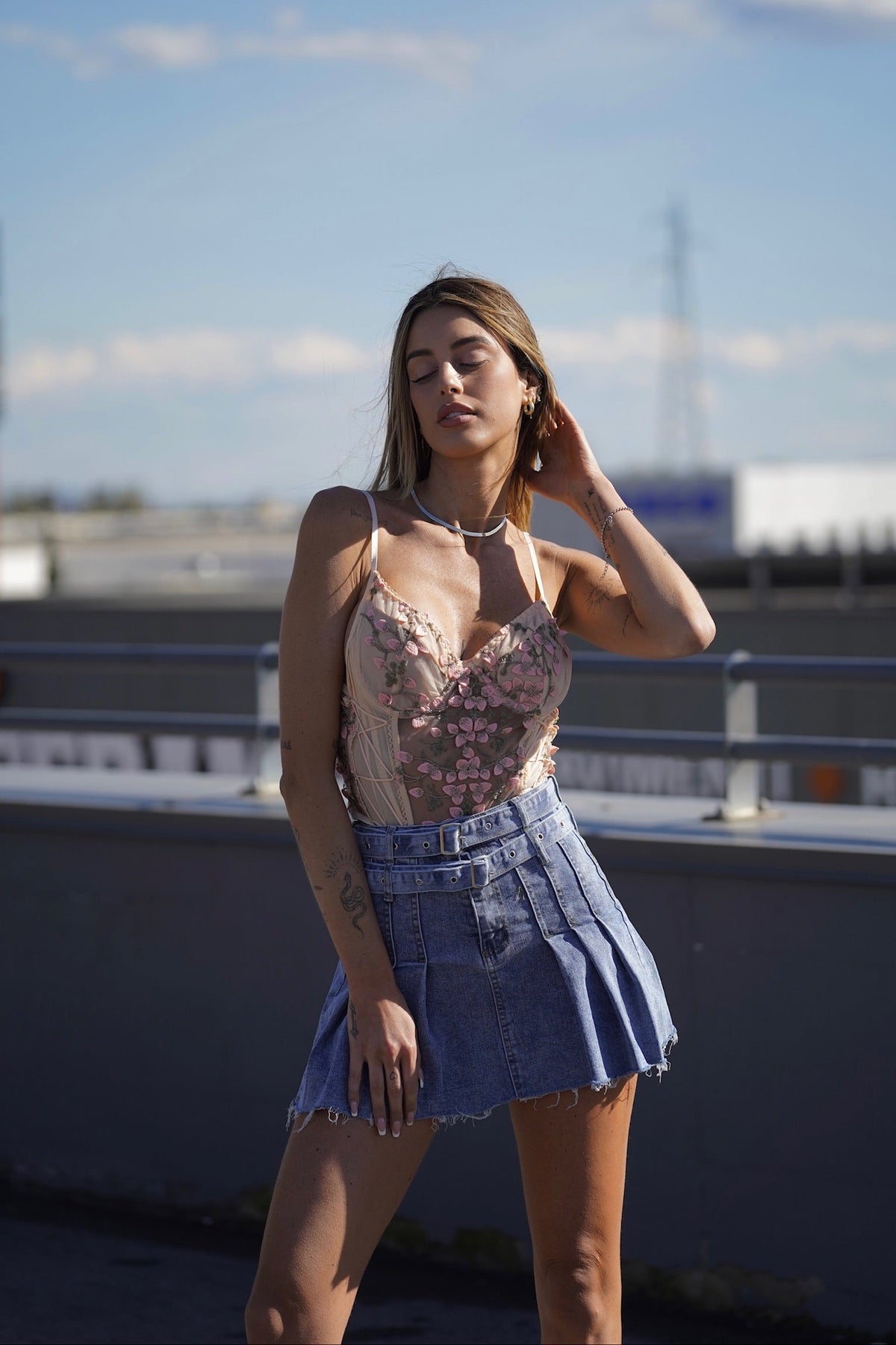 Body rosa con fiori