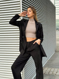 Completo giacca e pantalone nero
