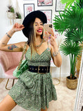 Abito verde con margherite