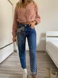 Jeans con borchie