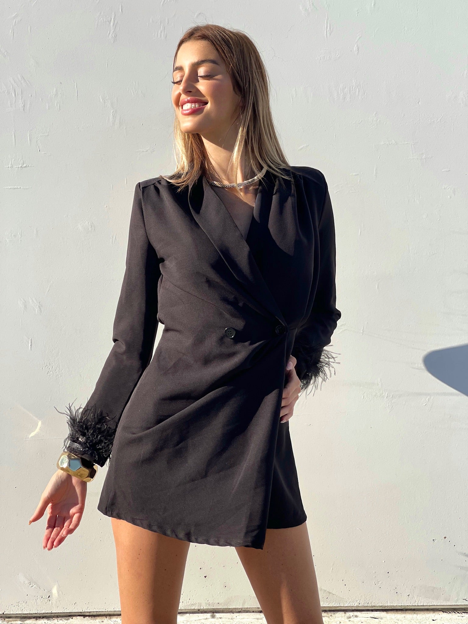 Blazer con piume