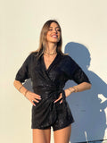 Tutina con paillette nera