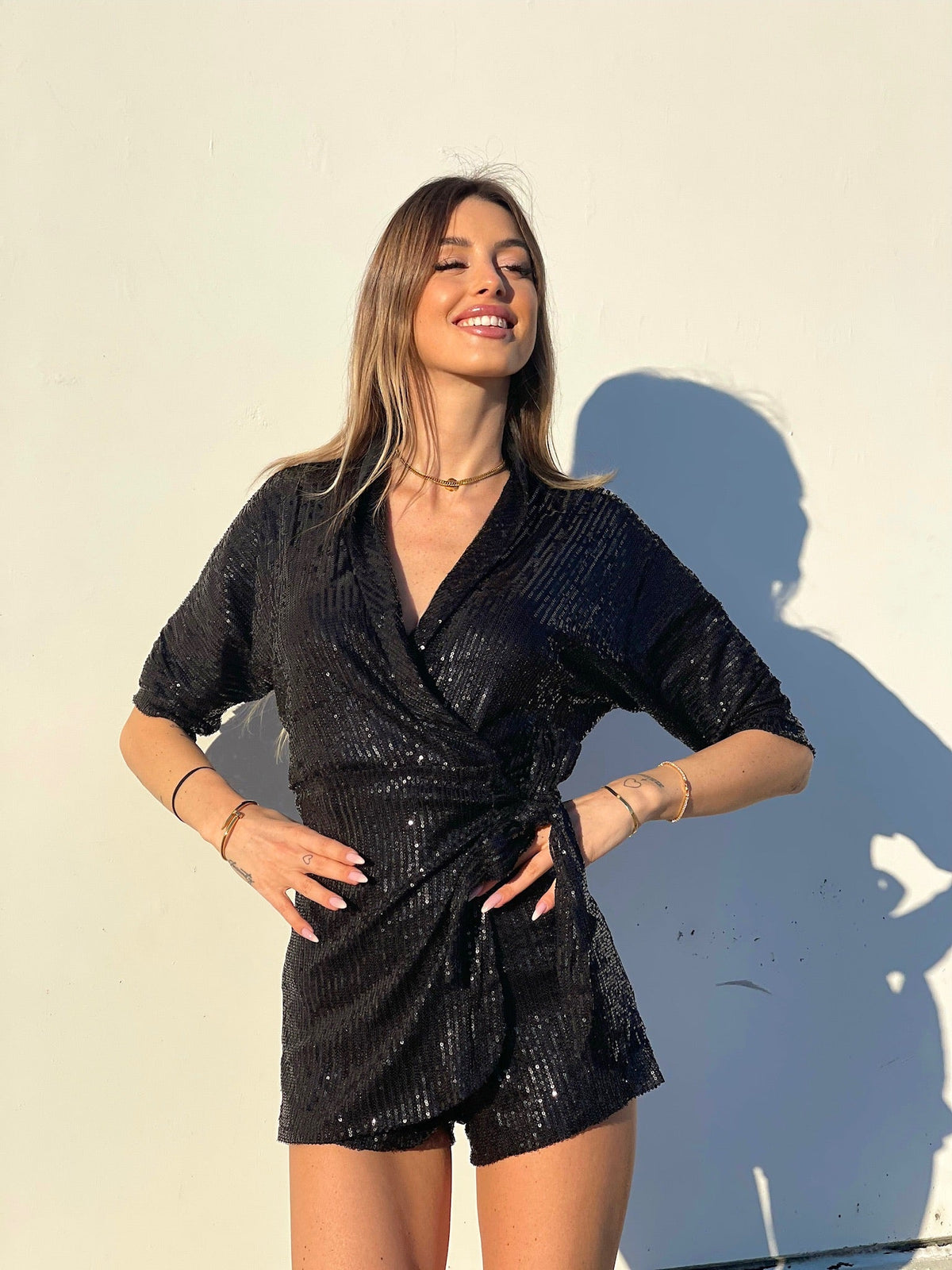 Tutina con paillette nera
