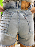 Short Vintage Levi’s jeans medio chiaro con borchie argento
