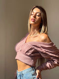 Maglione rosa con lacci