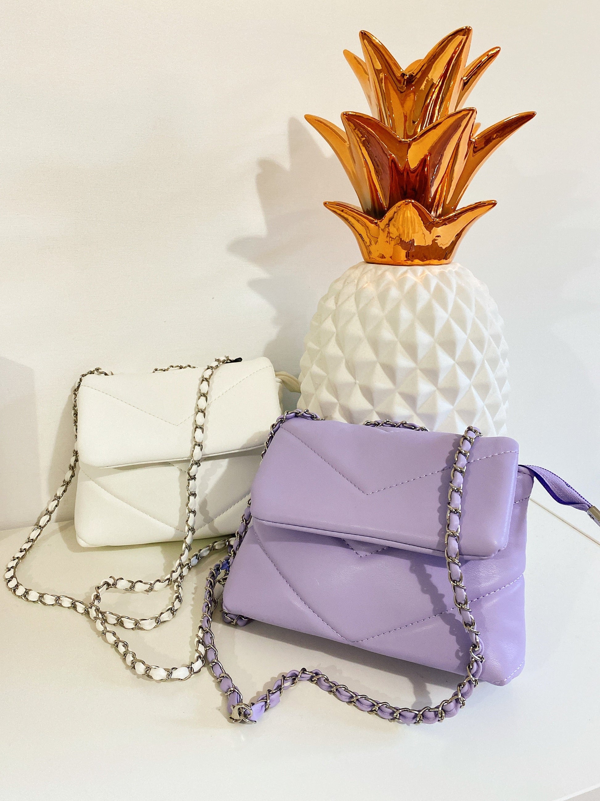 Pochette a mano con catena