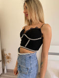 Top in pizzo con perle nero