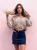 Cardigan panna a trecce