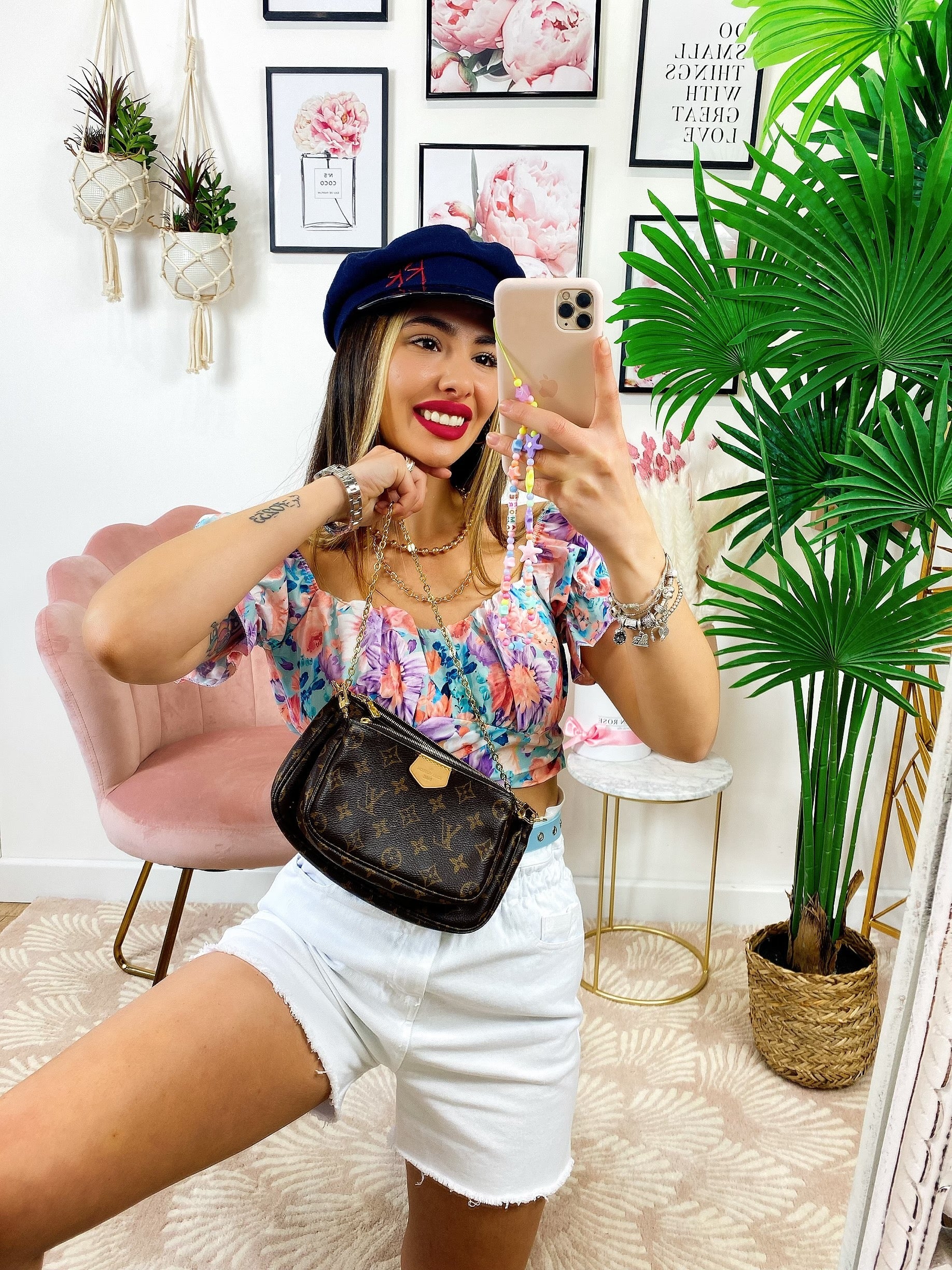 Top floreale con cintura