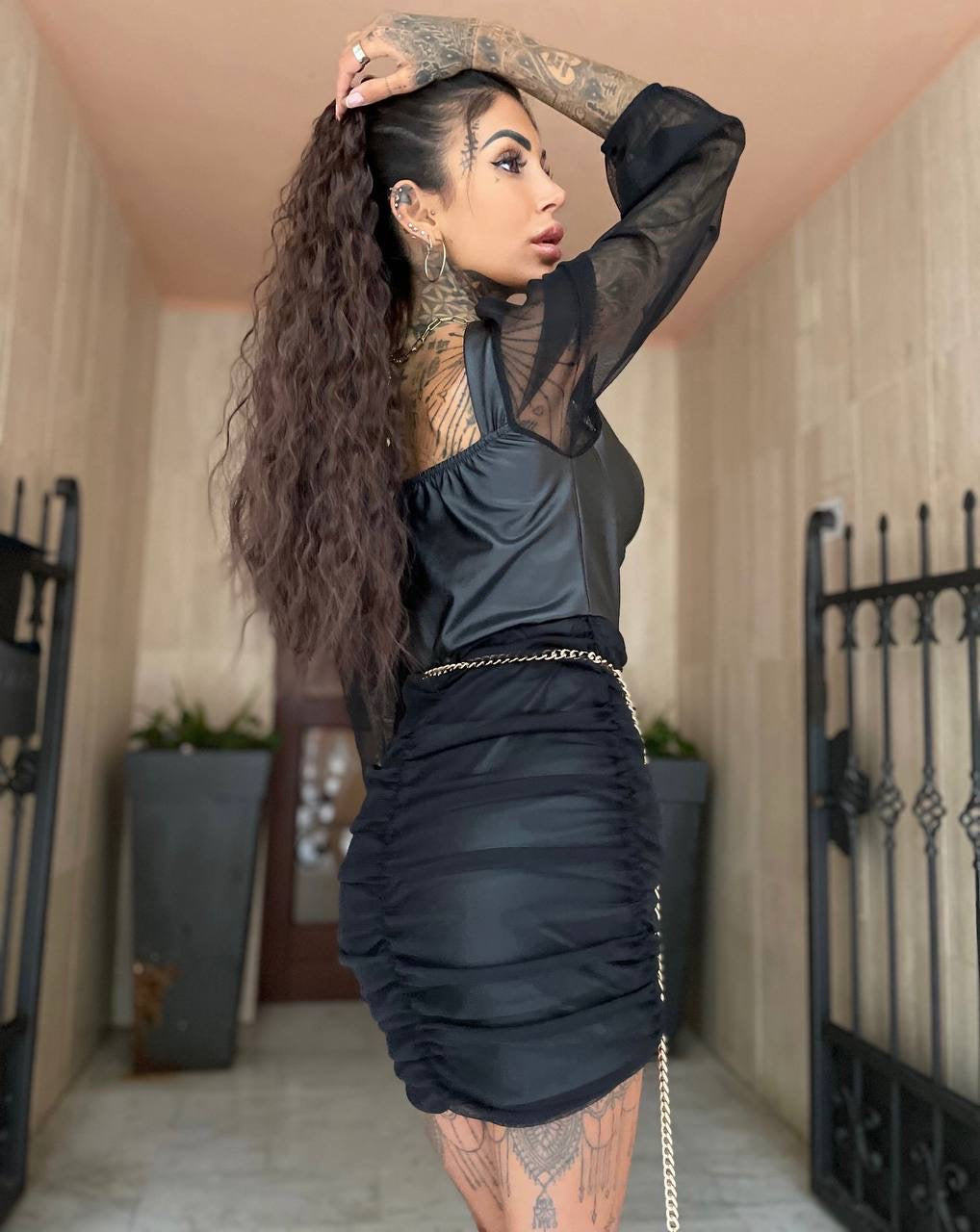 Abito in ecopelle e tulle