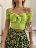 Top lime scollo a barchetta e fiocco