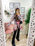 Cardigan A rombi dettagli rosa con frange e cinta