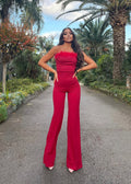 Tuta con piume rossa
