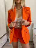 Completo giacca e short arancio