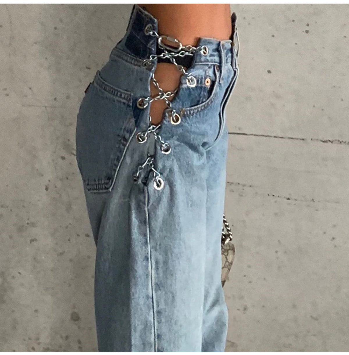 Jeans con catene