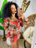 Tubino con fiori aranciati manica bombata