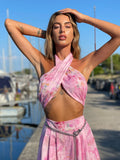 Completo top e pantalone rosa a fiori