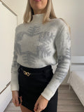 Maglione fiocco di neve bianco e argento