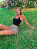 Top nero con incroci