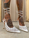 Tacchi alla schiava traforati Bianchi