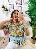 Camicia smanicata con borsetta base celeste