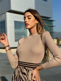 Abito in maglia nude gonna a fantasia zebrata